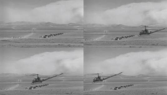 直升机在沙漠中低空飞行高清在线视频素材下载
