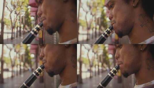 男人演奏单簧管 高清在线视频素材下载