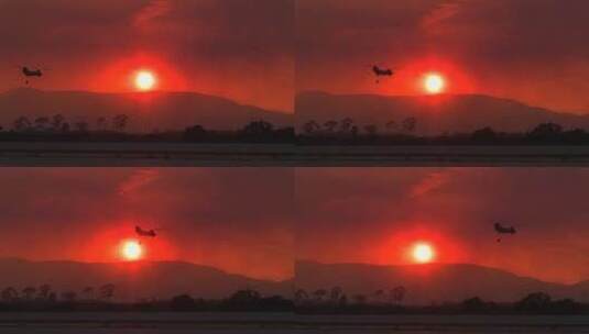 消防直升机迎着日落飞行高清在线视频素材下载