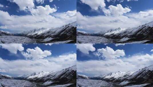 雪山蓝天白云航拍高清在线视频素材下载