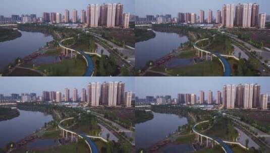航拍湖南衡阳陆家新区城市夜景人行观光桥高清在线视频素材下载