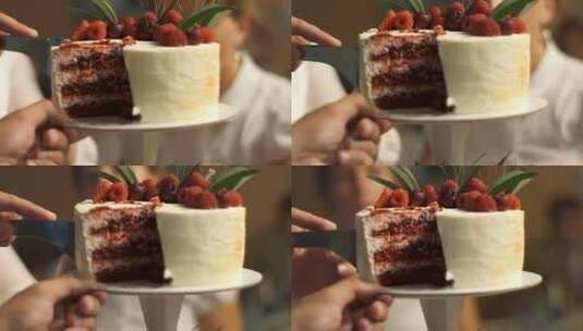 新婚夫妇切婚礼蛋糕的中段特写。迷人的高清在线视频素材下载