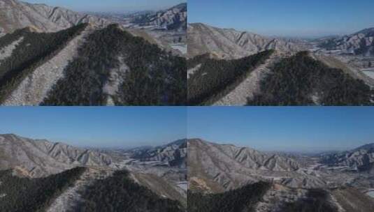 航拍大雪过后的山峰峡谷美景高清在线视频素材下载