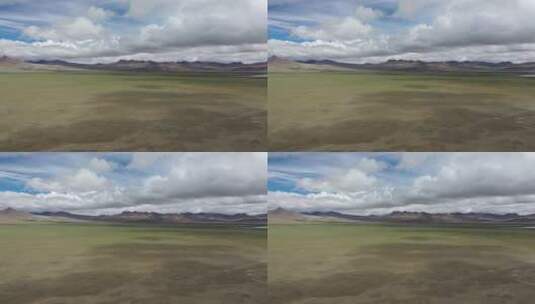 航拍西藏山南一望无际的草原蓝天白云高清在线视频素材下载