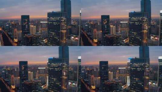 西安地标高新都市之门写字楼航拍夕阳夜景高清在线视频素材下载