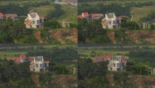 悬崖山顶红色的房子高清在线视频素材下载