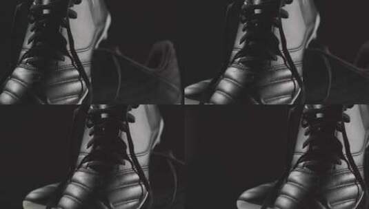 工作室静物拍摄足球靴特写高清在线视频素材下载