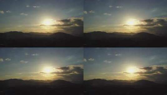 傍晚天空夕阳实拍黄昏山日落阳光云远山峰朵高清在线视频素材下载