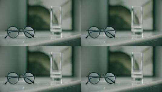老花眼镜玻璃水杯高清在线视频素材下载