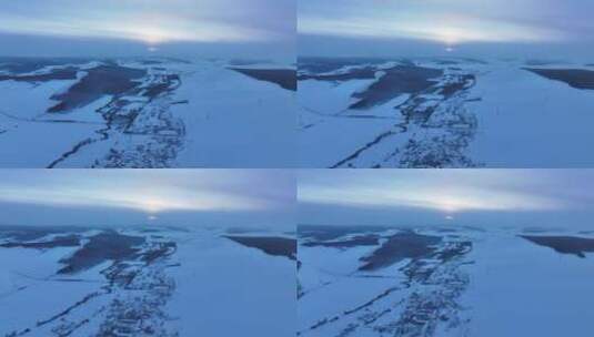 航拍内蒙古雪原版画雪村南波河高清在线视频素材下载
