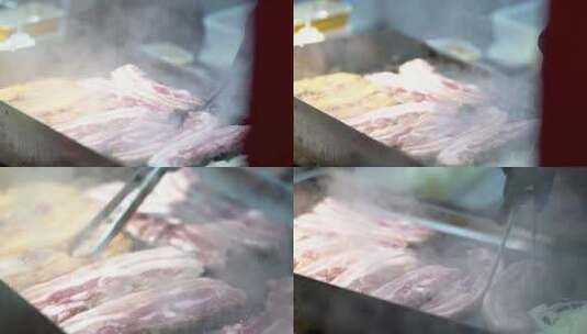 美食街煎五花肉高清在线视频素材下载