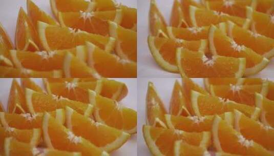 多汁的橙色切片楔形分离在白色背景上稳定运动新鲜水果富含维生素C，高清在线视频素材下载