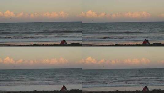 日落时分巴西海滩上的幸福夫妇高清在线视频素材下载