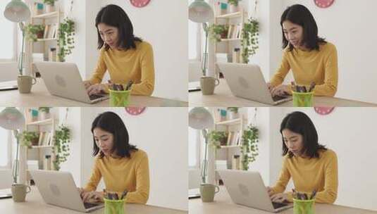 女人在家用笔记本电脑工作高清在线视频素材下载