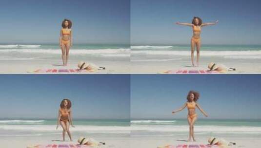 妇女在海滩上跳跃高清在线视频素材下载