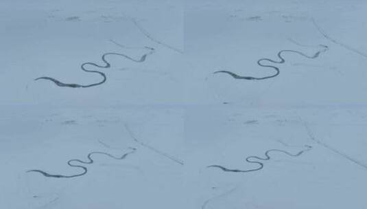 航拍冬天的草原雪原曲河道路雪景风光高清在线视频素材下载
