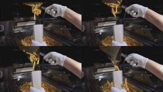 快餐店工作人员在炸薯条高清在线视频素材下载