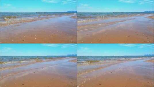 蓝天白云下沙滩与海浪 4K高清在线视频素材下载