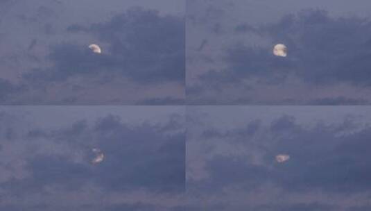 云层覆盖的天空中的月亮高清在线视频素材下载