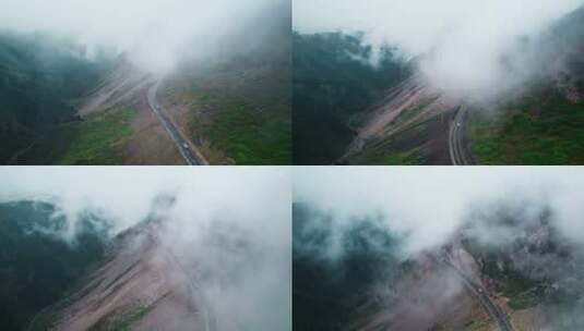 航拍云雾中的伊昭公路高清在线视频素材下载