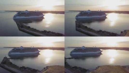 大型白色邮轮七海辉煌号抵达利耶帕亚港（拉脱维亚）的鸟瞰图高清在线视频素材下载