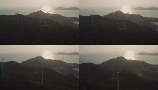 海岛朝霞及山顶风车高清在线视频素材下载