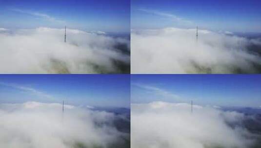 航拍云海中的电视信号塔高清在线视频素材下载