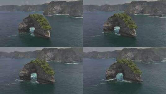HDR印尼佩尼达岛航拍岛屿海蚀洞风光高清在线视频素材下载