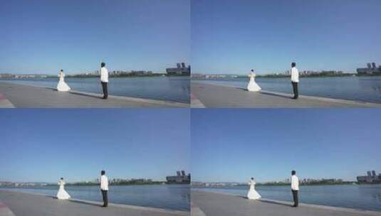 天府新区兴隆湖湖边走廊打卡拍照新人婚纱高清在线视频素材下载