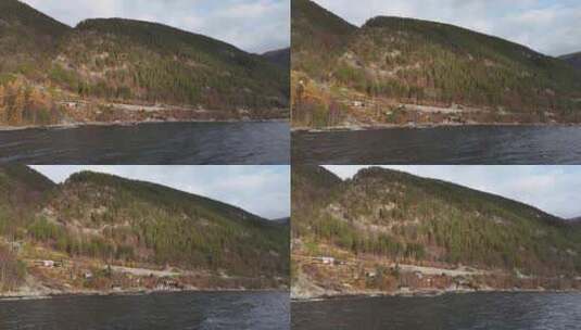 挪威峡湾森林悬崖边的乡村小屋高清在线视频素材下载
