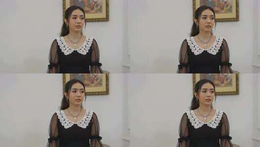 室内女性着装展示高清在线视频素材下载