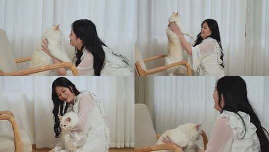 女生窗边与可爱猫咪互动玩耍高清在线视频素材下载