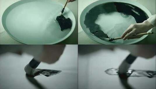 毛笔蘸墨于瓷盘的素材高清在线视频素材下载