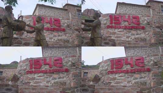 抗日县政府旧址旁人物雕像高清在线视频素材下载
