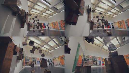 现代艺术展厅内的立体装置与壁画高清在线视频素材下载
