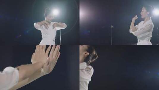 舞台灯光下的女人的优雅舞姿高清在线视频素材下载