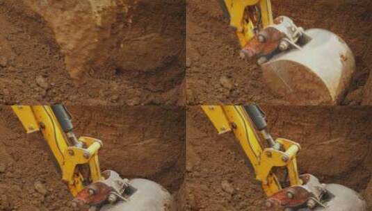 挖掘机铲斗挖泥土特写镜头高清在线视频素材下载