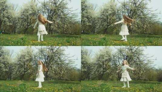 女孩在树木开花的背景下旋转高清在线视频素材下载
