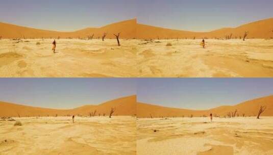 一名妇女在沙丘奔跑高清在线视频素材下载