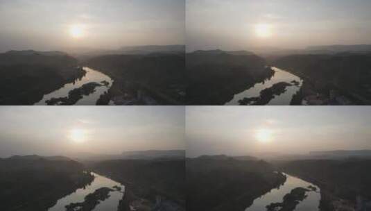 航拍大山河流日落夕阳剪影高清在线视频素材下载