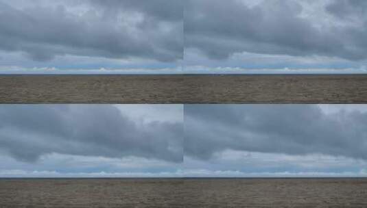天空多云的空荡荡的海滩高清在线视频素材下载