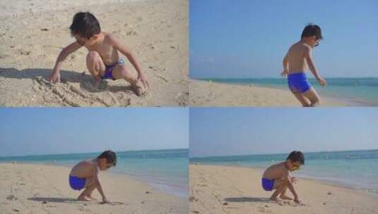 开心小男孩沙滩画画玩沙子高清在线视频素材下载