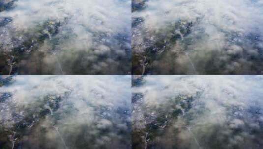 俯瞰云雾中的村庄高清在线视频素材下载