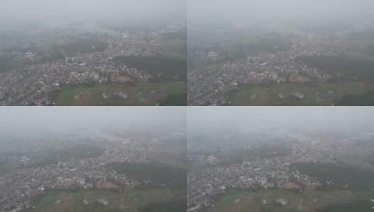 航拍雨雾中的乡村高清在线视频素材下载