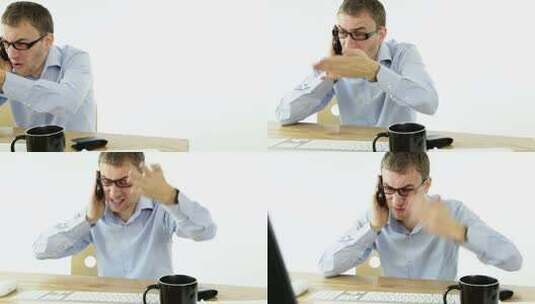 男人在办公桌生气的地打着电话高清在线视频素材下载