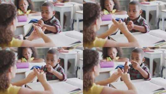 女老师在教男孩学习高清在线视频素材下载