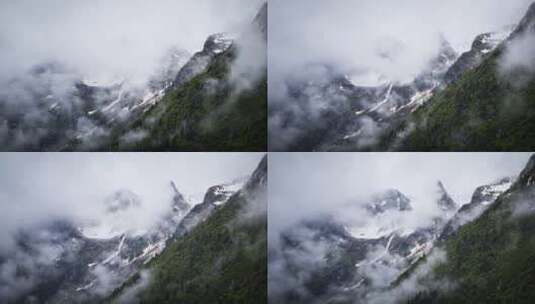 山峰山顶雪山绿色森林迷雾森林云雾飘动延时高清在线视频素材下载