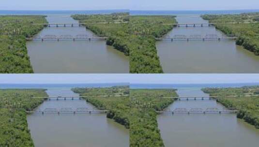 在圣佩德罗德马科里斯的里约索科新桥与旧桥的鸟瞰图高清在线视频素材下载