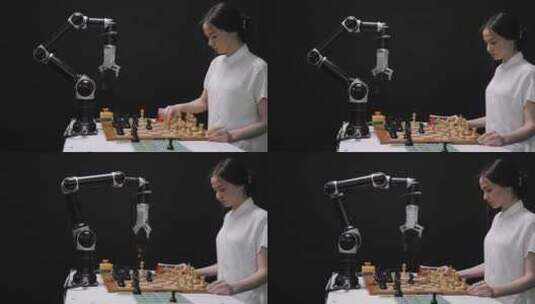 女生与机械手臂下棋高清在线视频素材下载