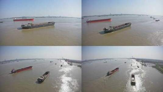 航拍长江轮船货轮江边高清在线视频素材下载